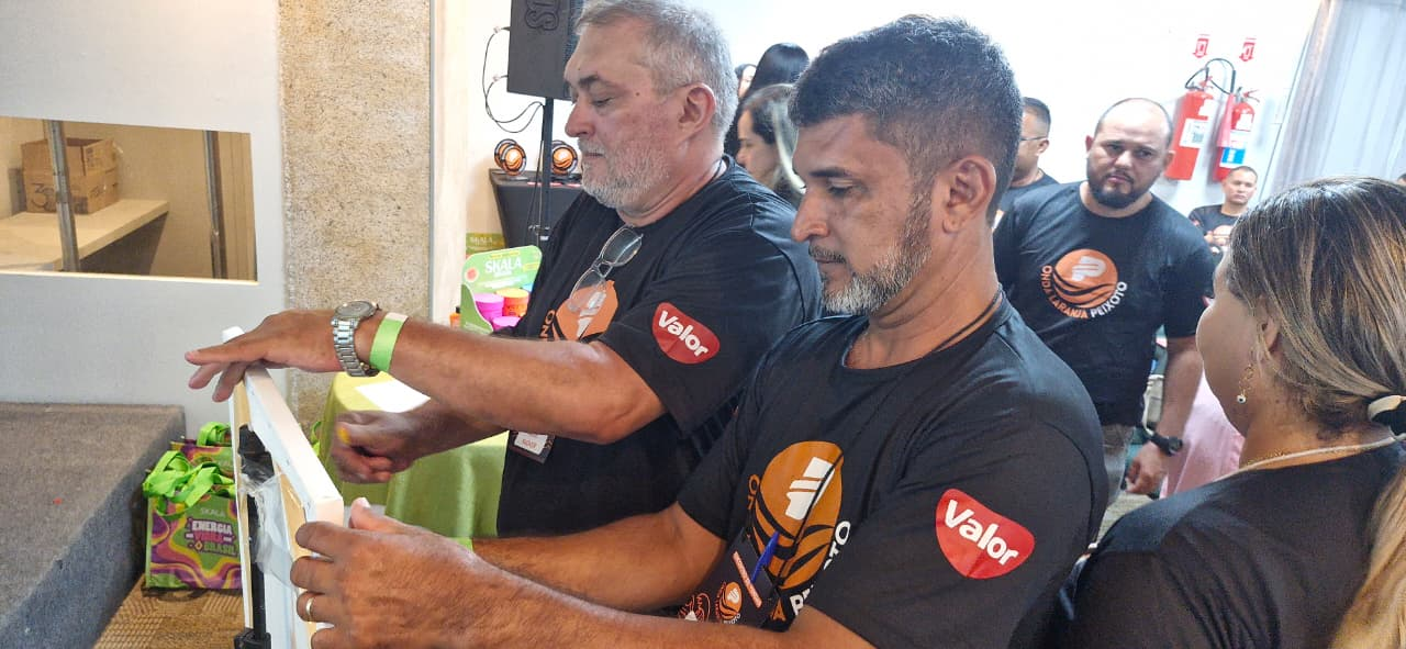 Representantes participando da Árvore do Legado durante o encontro